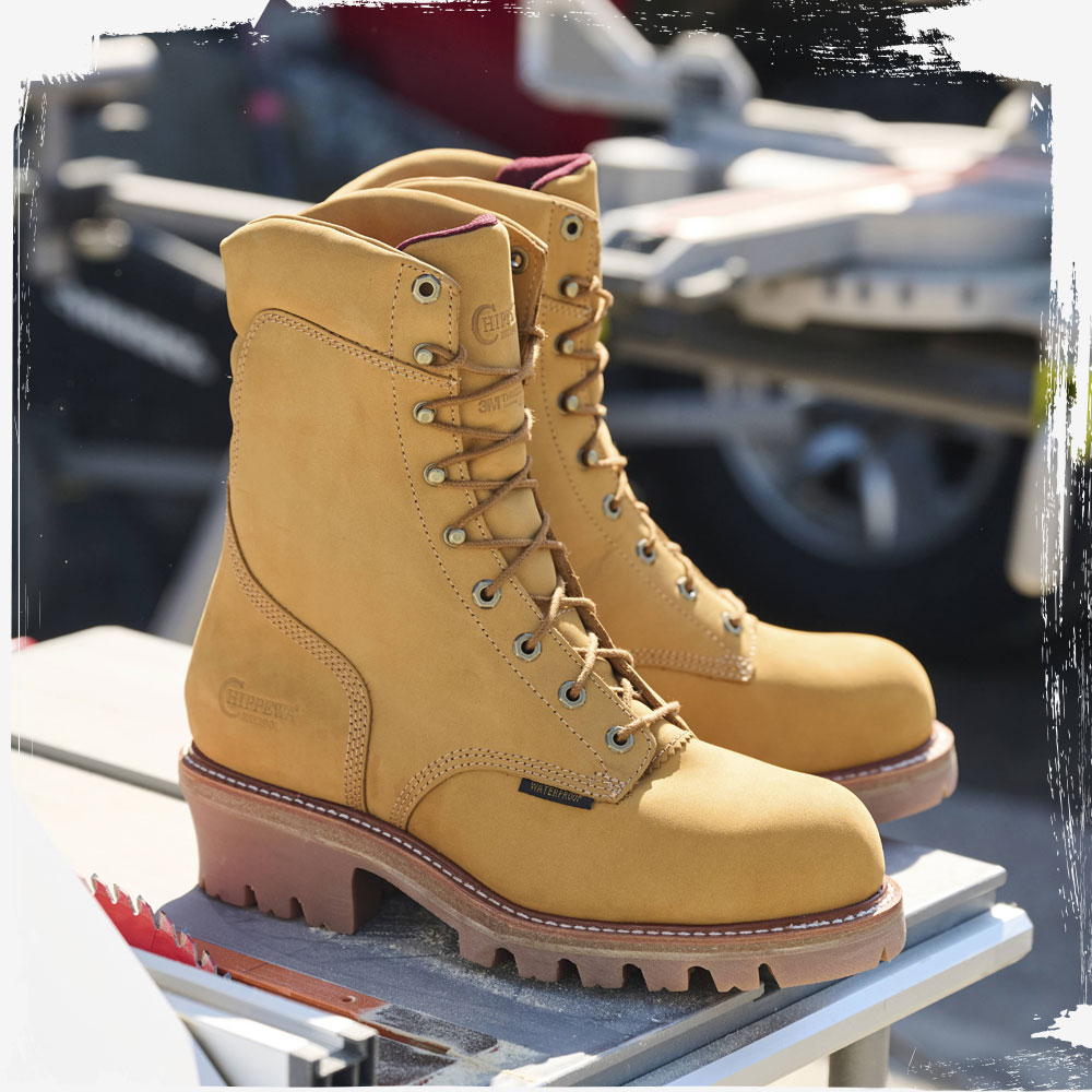 The Super Dna 9" Waterproof Insulated Steel Toe in Wheat Tan n a table saw.