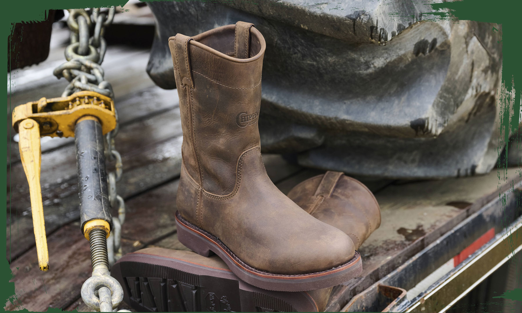 The Classic 2.0 10" Pull On in chocolate apache (brown) in front of a tire.