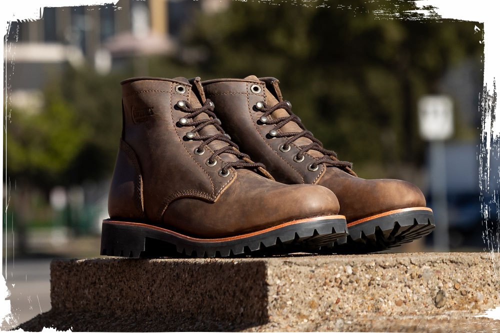 The Chippewa Classic 2.0 6" Lace Up in Apache Brown on a slab of concrete.
