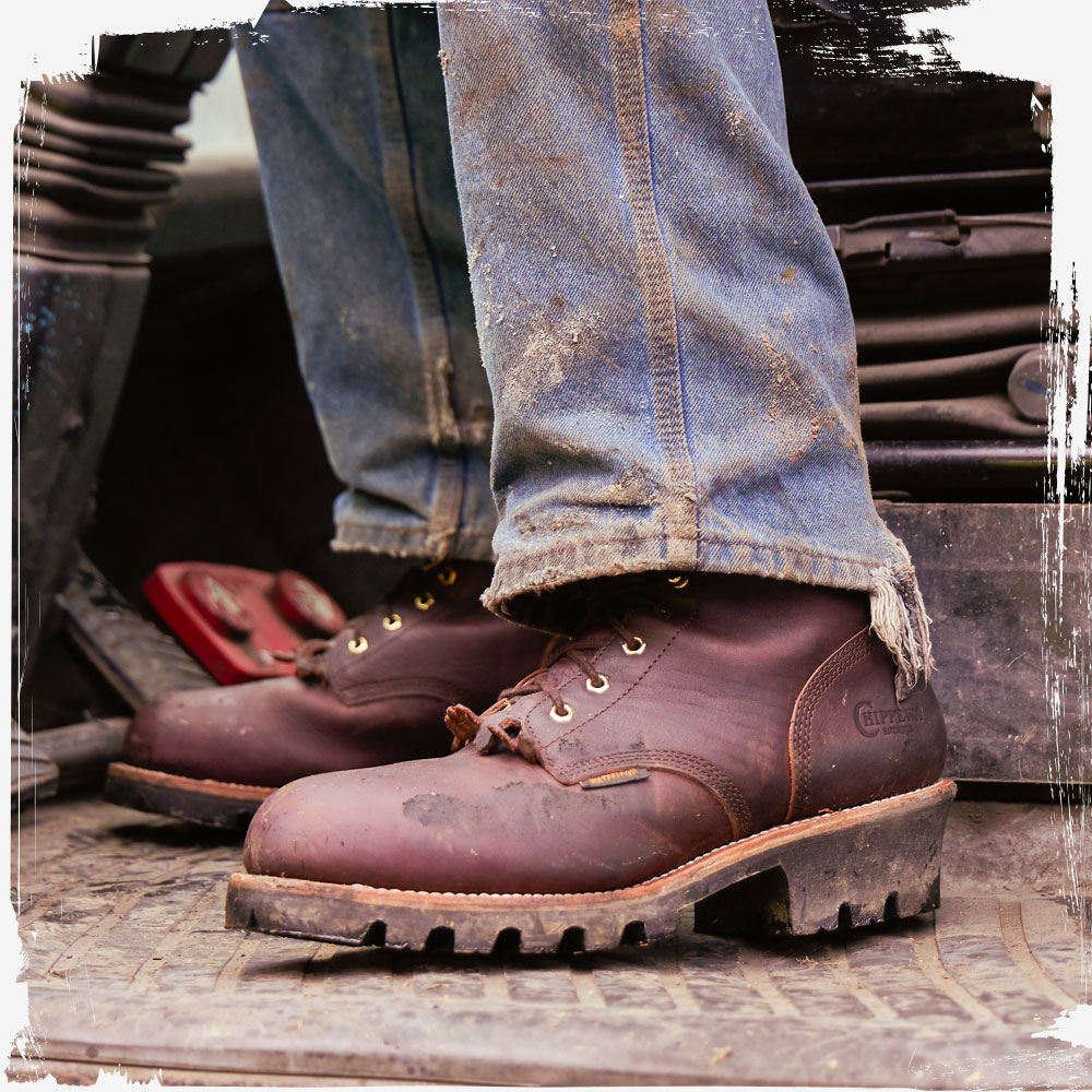 A Man wearing the Paladin 8" Waterproof Insulated Steel Toe Logger in Brair (brown).