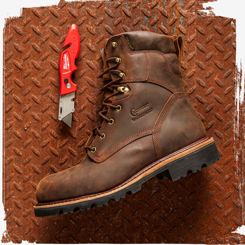 The Super Dna 8" Waterproof Steel Toe Insulated boot in Bay Apache (Tan) on a sheet of metal.