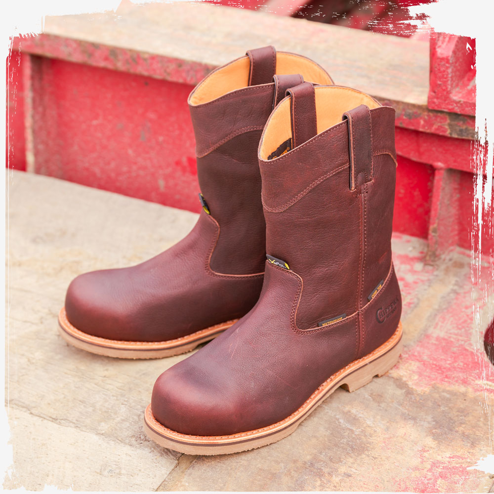 The Serious Plus 10" Waterproof Nano Comp Toe Met Guard Puncture Resisting in Briar Oiled (brown) in the bed of a truck.