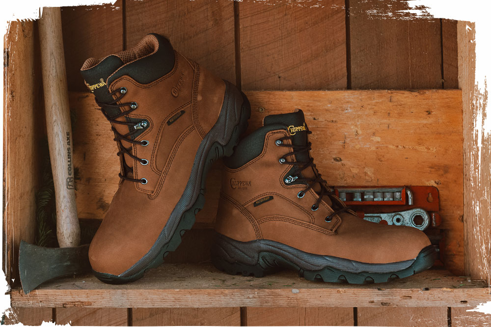 The Graeme 6" Waterproof Comp Toe Hiker in Brown surrounded by tools.