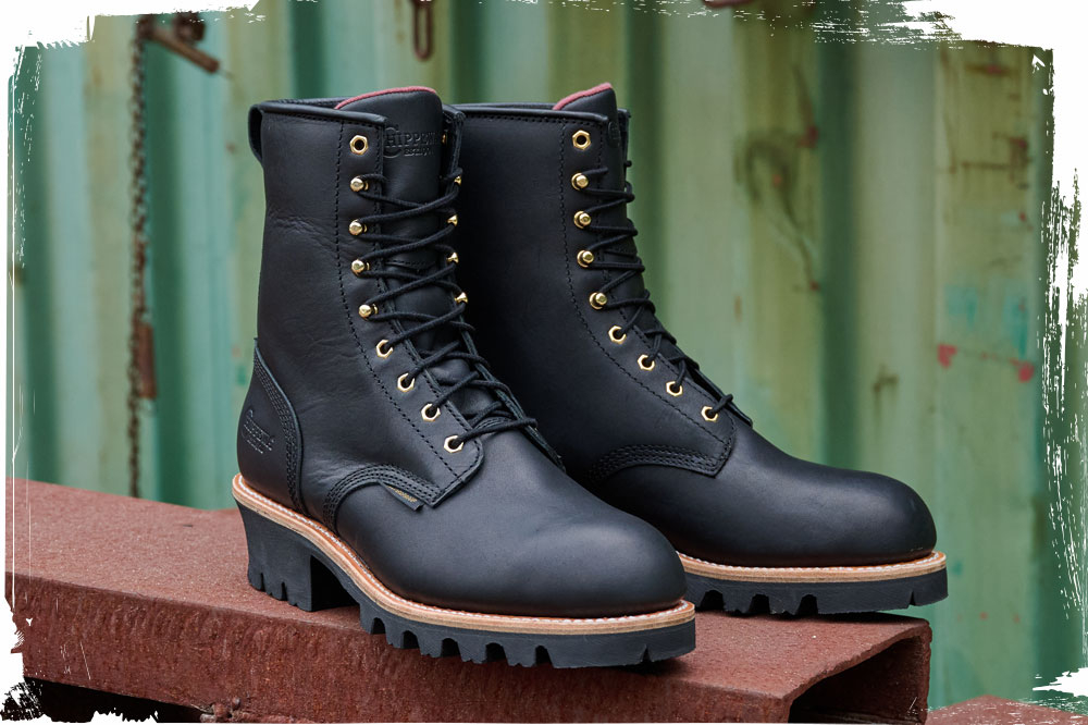 The Paladin 8" Waterproof Insulated Steel Toe Logger in black displayed on a steel beam.