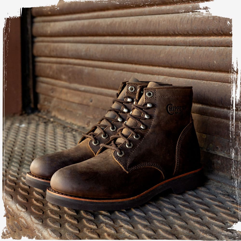 The Classic 2.0 6" Lace Up in wood brown on a loading dock.