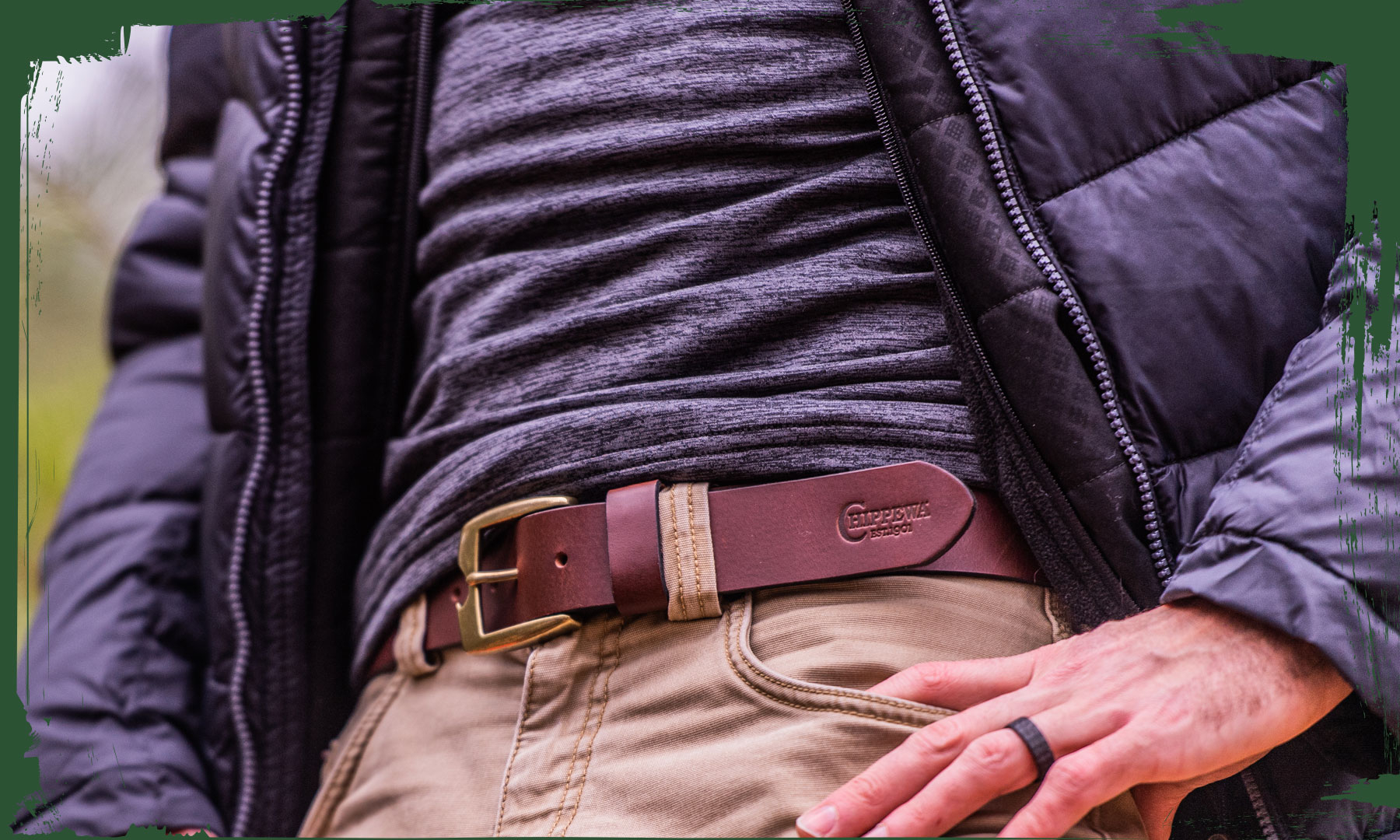 A man wearing the Bridgeton Men's Belt in Chestnut (Brown).