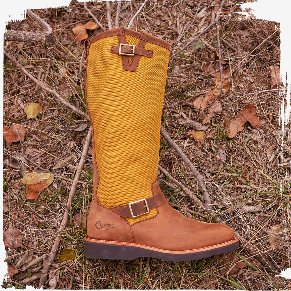 The Cottonwood 17" Snake Boot in Hickory Brown laying on the ground.