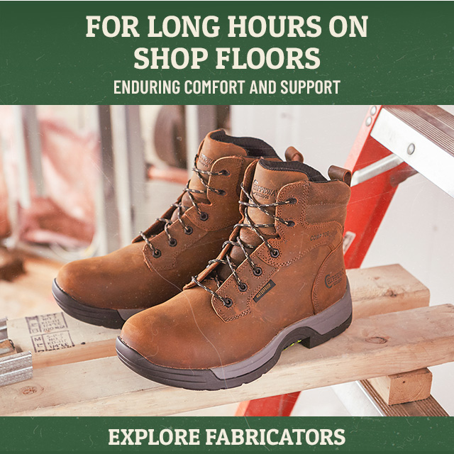 For long hours on shop floors. Enduring comfort and support. Explore/Shop fabricators. A pair of fabricator 6” waterproof comp toe hikers in brown sitting on a work bench.